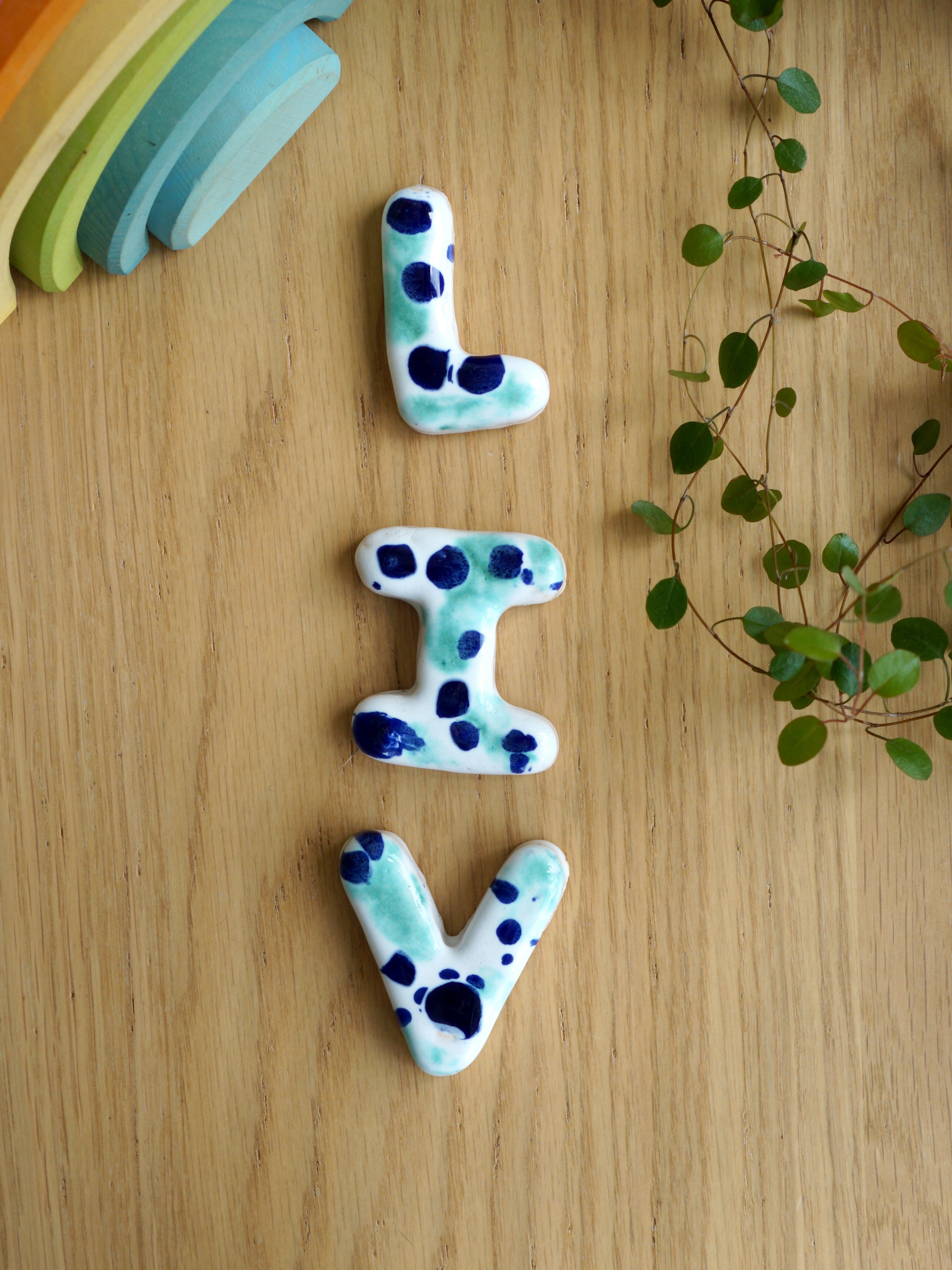 Keramische letters LIV