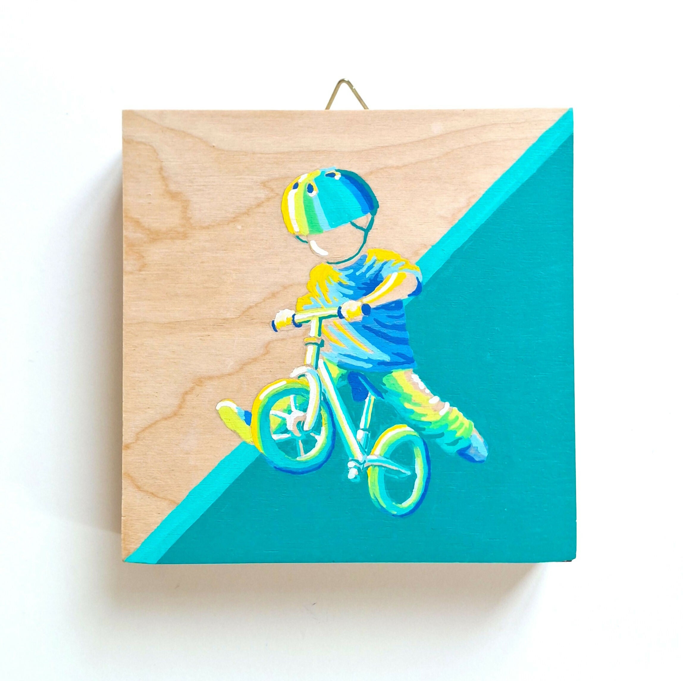 Schilderij van kind spelend op fiets