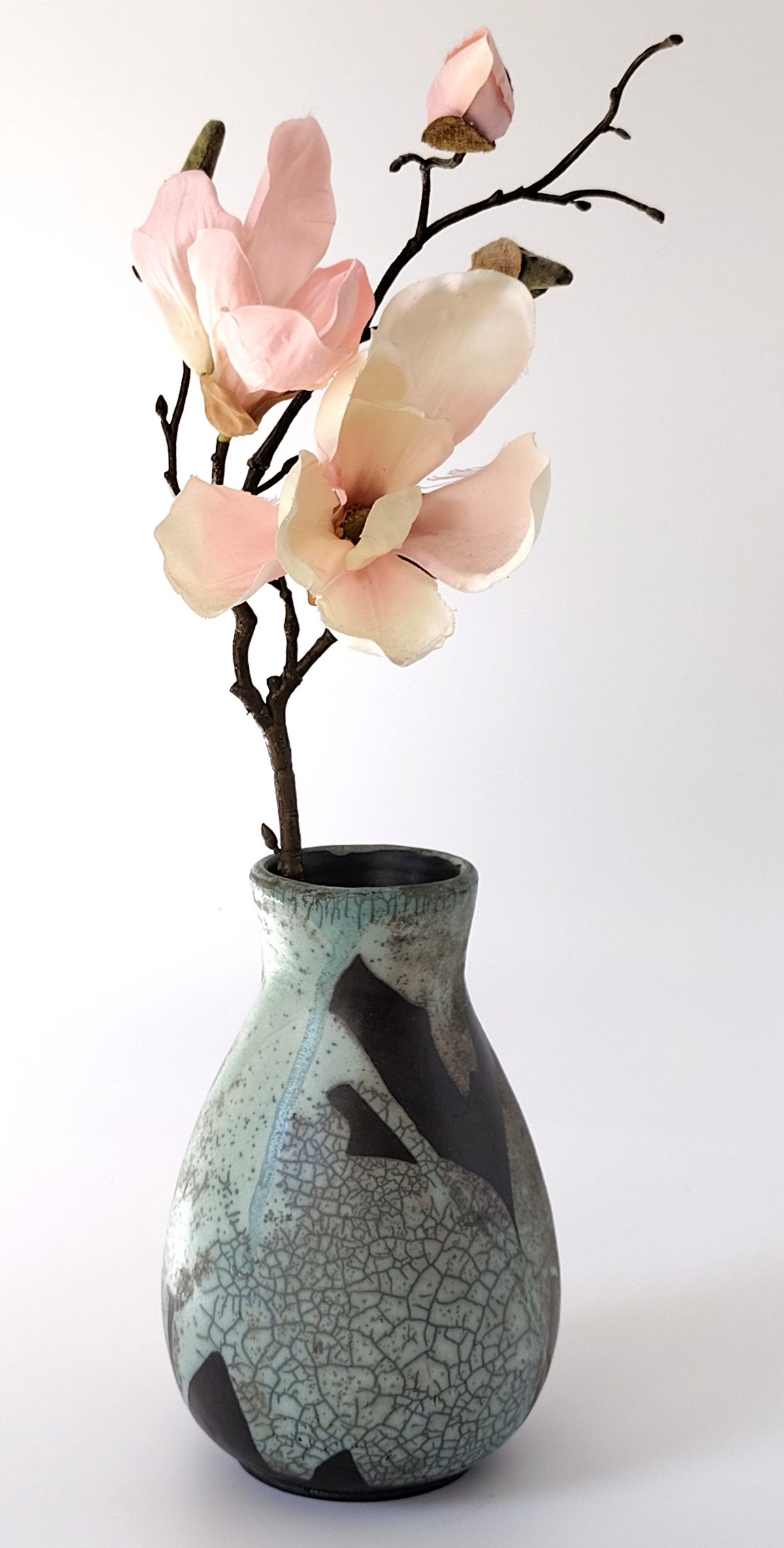 Raku celadon vase by Sabrina keramiek