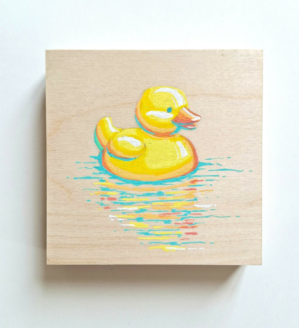 Schattige eendenkunst op hout